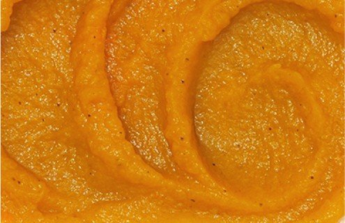 Close up of a Carrot Apple Ginger Babyblend showing the three ingredient combos typical of Stage 3